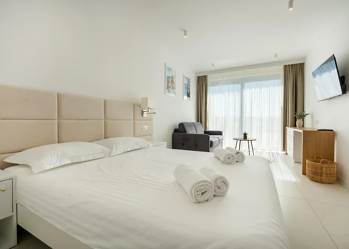 Апартаменты Wind Rose Maestral-beachfront